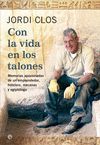 CON LA VIDA EN LOS TALONES